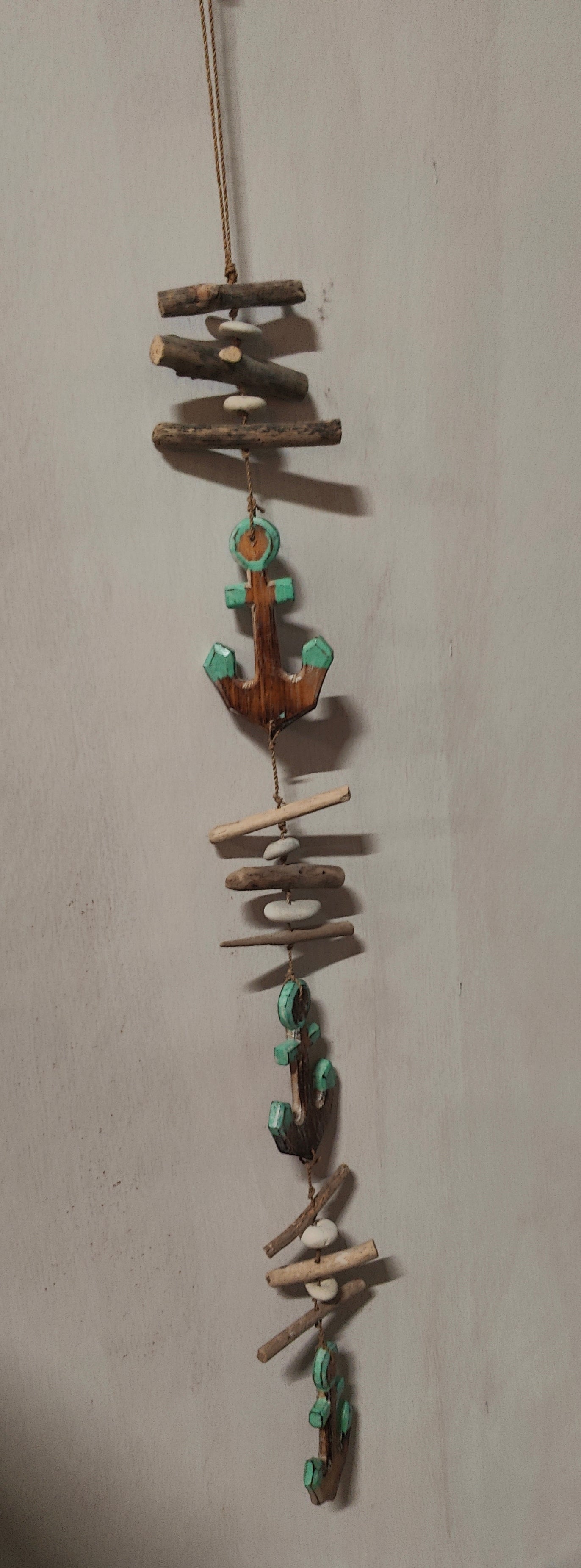 JT022		houten slinger met ankers lang ca 1,00 mtr.